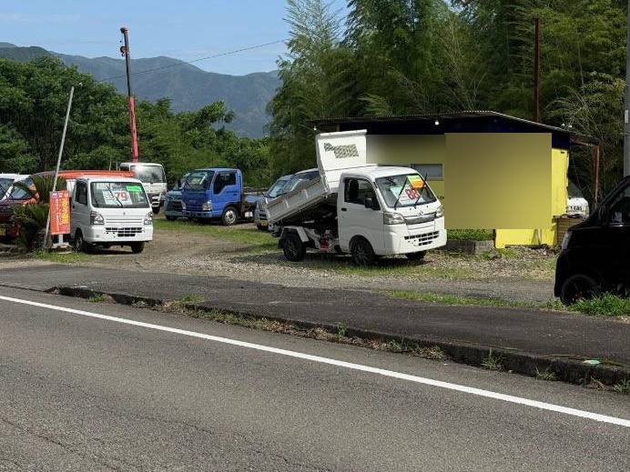 Kei dump truck with the bed raised