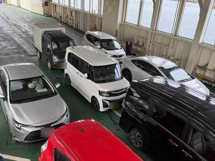 Vehicles parked on the car deck of a roll-on/roll-off ship